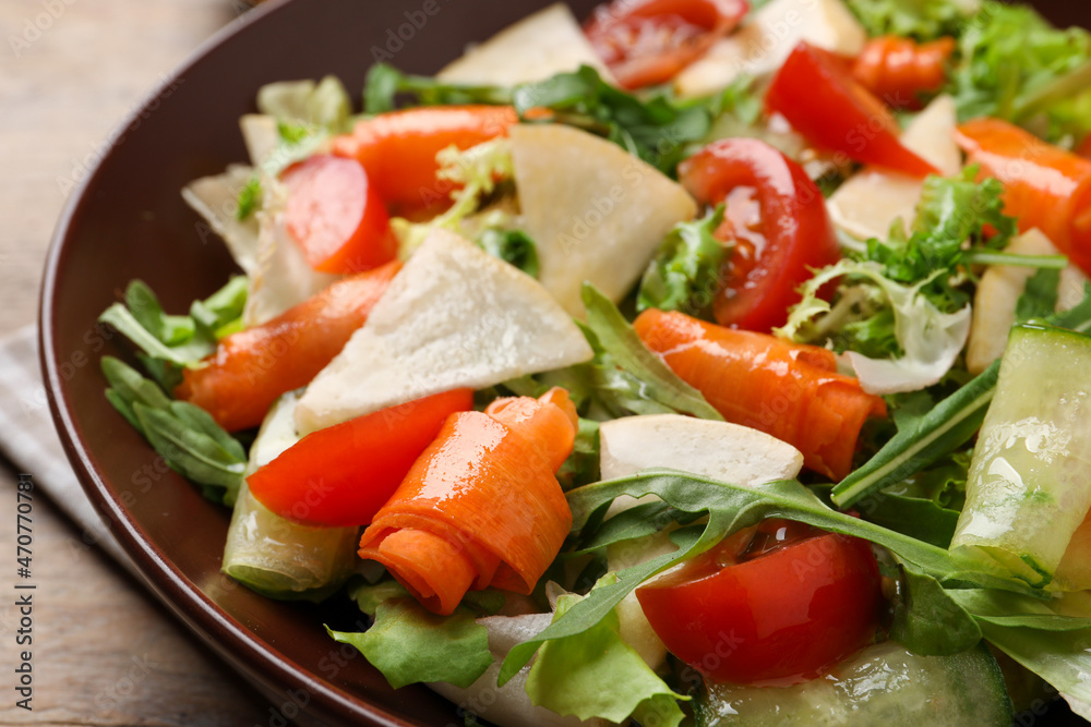 Delicious turnip salad served in bowl, closeup Delicious turnip salad served in bowl, closeup