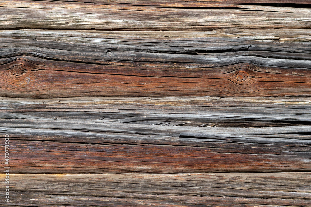 Background from old wooden boards with an interesting texture. Textured wood pattern. Background from old wooden boards with an interesting texture. Textured wood pattern.
