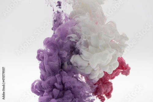 white pink and purple smoke on a white background.