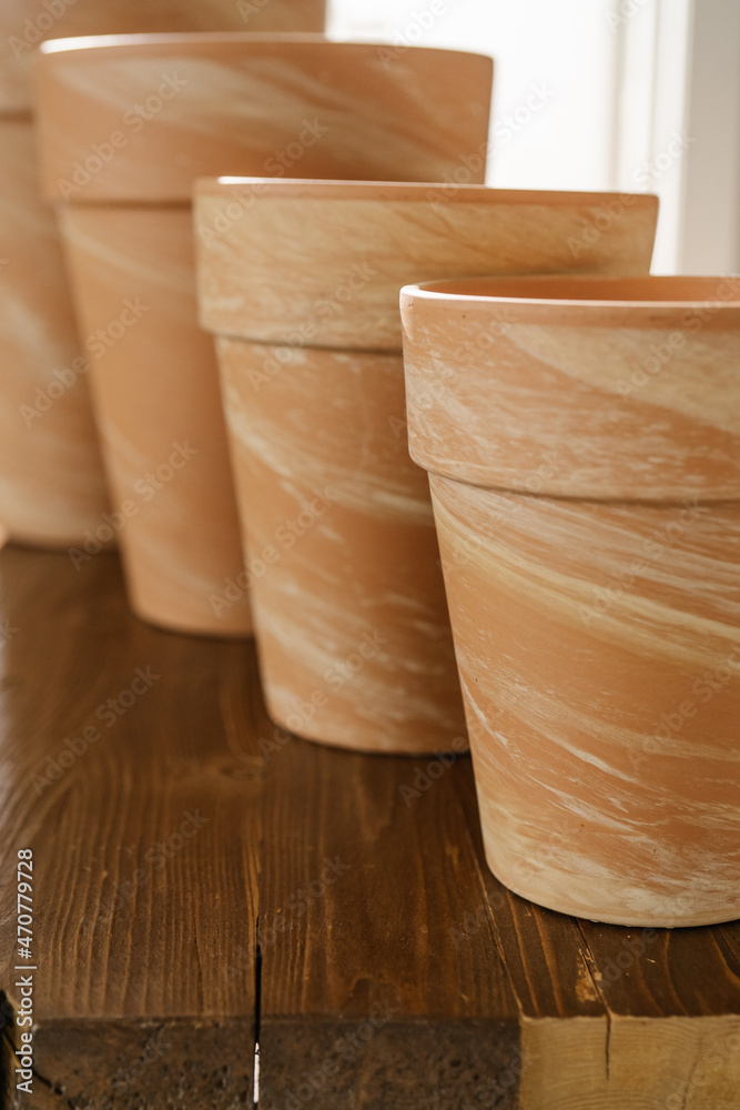 The texture of terracotta pots in close-up. The texture of terracotta pots in close-up.