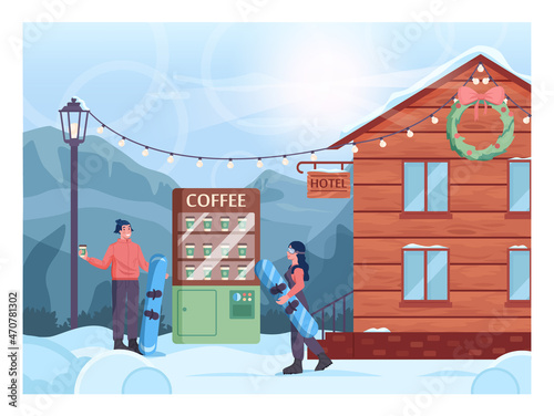 Snowboarders buying a coffee at the coffee machine. Ski and snowboarding resort