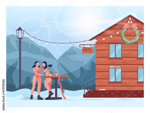 Snowboarder girls in bikini taking a picture in front of a cableway.