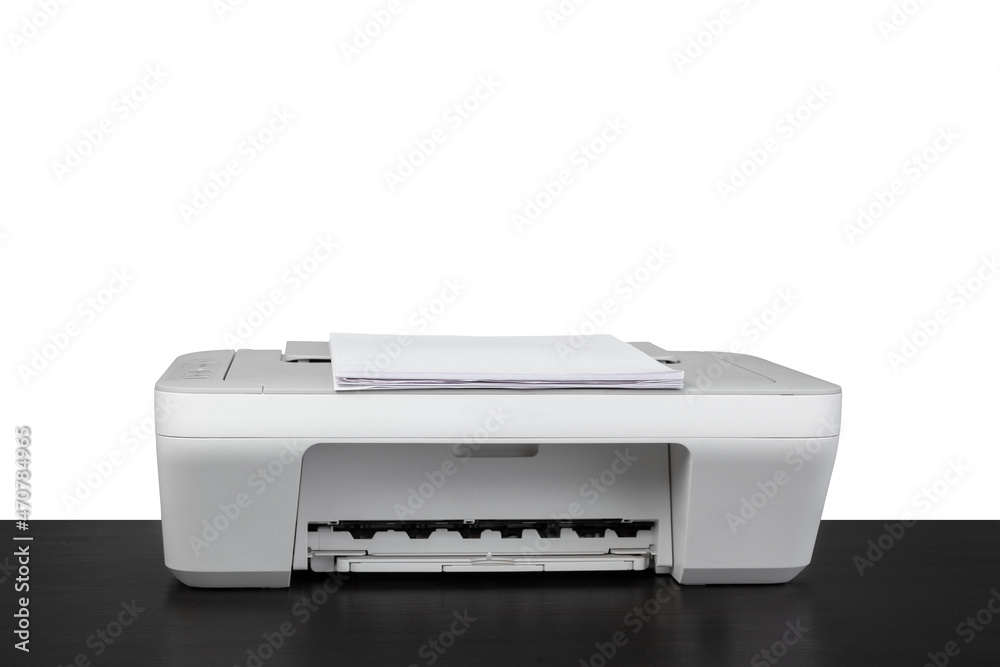 Laser home printer on table against white backgorund Laser home printer on table against white backgorund