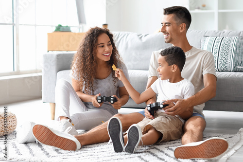 Happy interracial family pl...