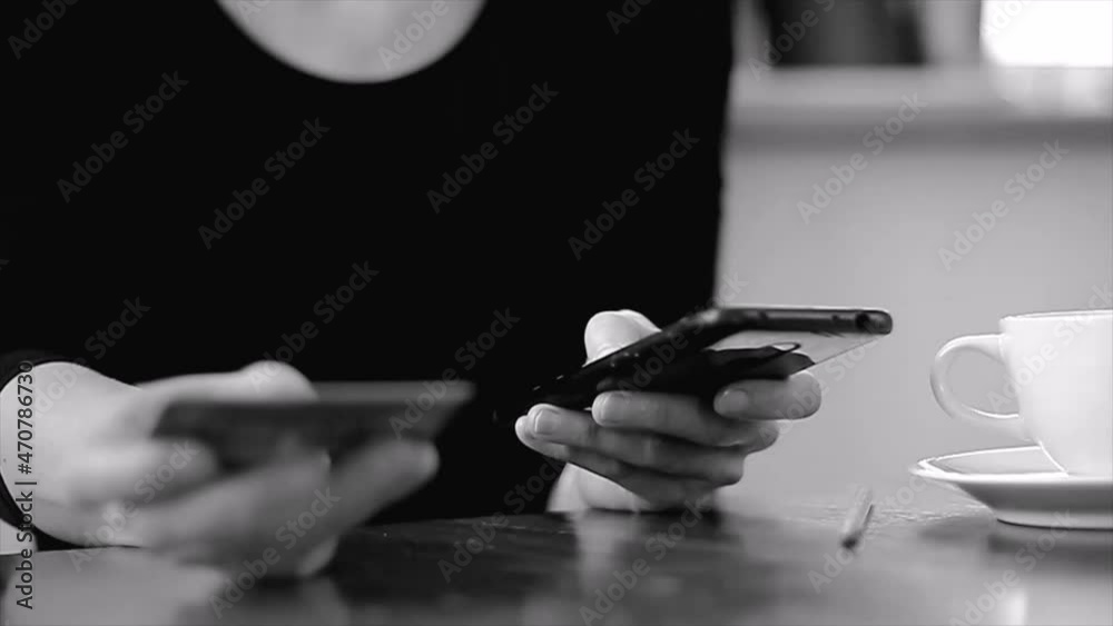 woman with mobile phone and cridit card in hand surfing the internet for work at home stock video woman with mobile phone and cridit card in hand surfing the internet for work at home stock video