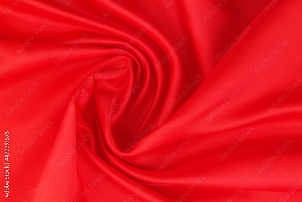Red satin or silk fabric backdrop. Beautiful wallpaper, wedding background or design element. Red satin or silk fabric backdrop. Beautiful wallpaper, wedding background or design element.