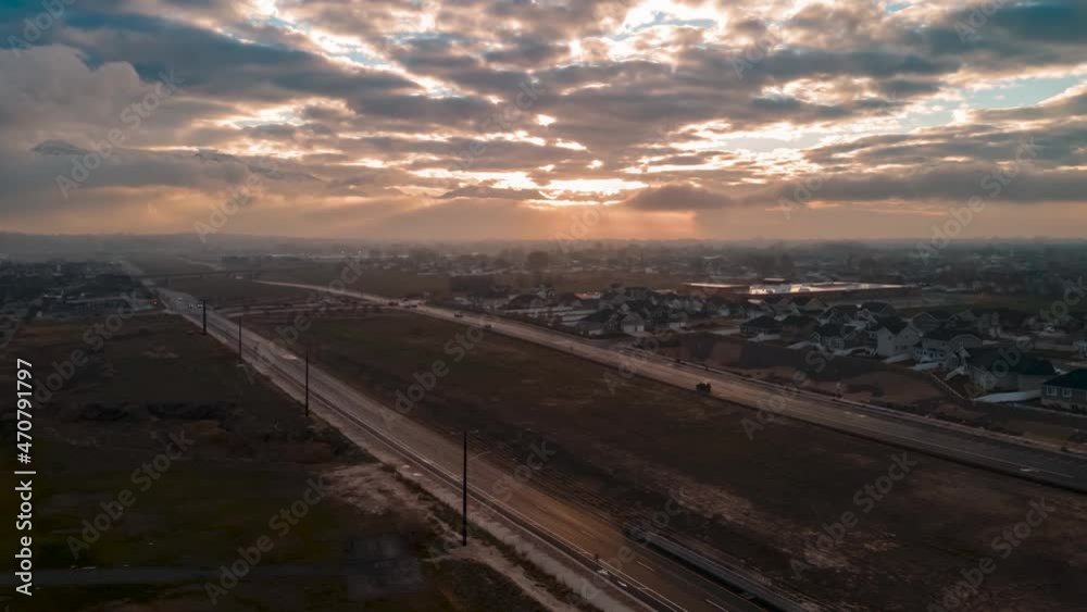 Fog and an overcast sky subdue the sunrise in this American suburb - aerial hyper lapse Fog and an overcast sky subdue the sunrise in this American suburb - aerial hyper lapse