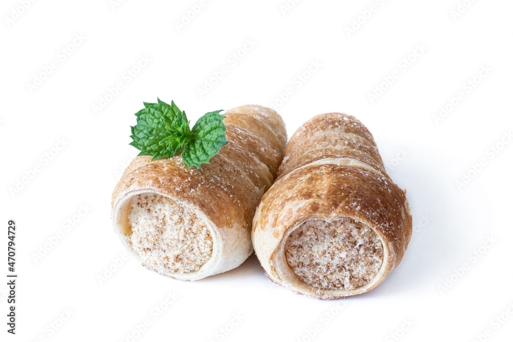 Puff pastry horns isolated on white background