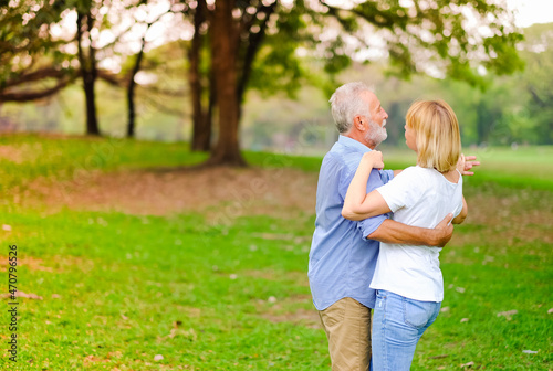 Portrait caucasian senior woman and old man, couple elder in love happy in park