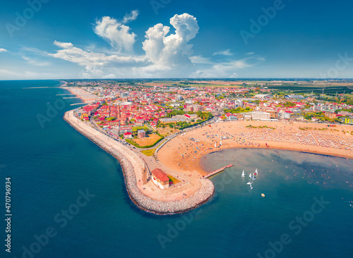 Сharm of the ancient cities of Europe. View from flying drone of Madonna dell'Angelo church - small seaside chapel, built in 1751 and dedicated to the Virgin Mary, Caorle town, Italy, Europe. #470796934