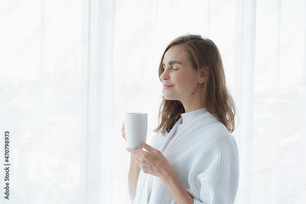 girl drinking hot coffee or tea in morning girl drinking hot coffee or tea in morning