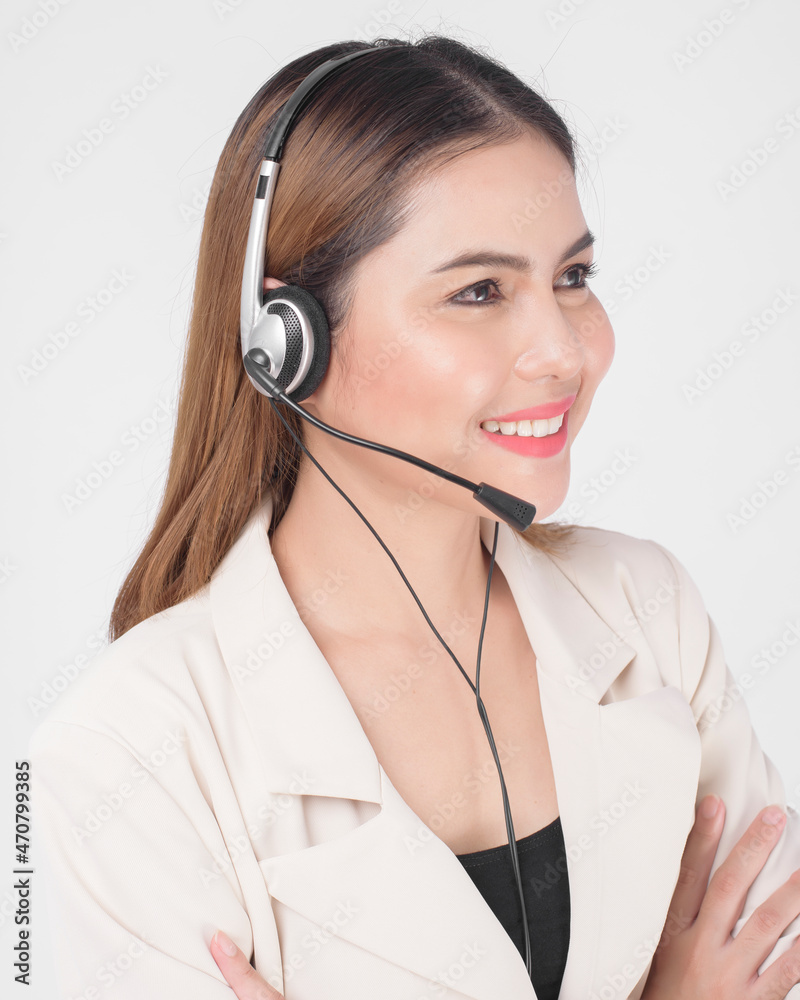 Customer service operator woman in suit wearing headset over white background studio. Customer service operator woman in suit wearing headset over white background studio.