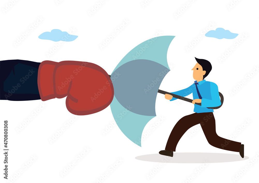 Businessman holding an open umbrella which protects from attacking boxing.