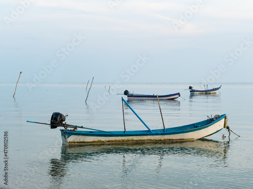 Boats at dawn in Surat Thani, Thailand © Thor Jorgen Udvang