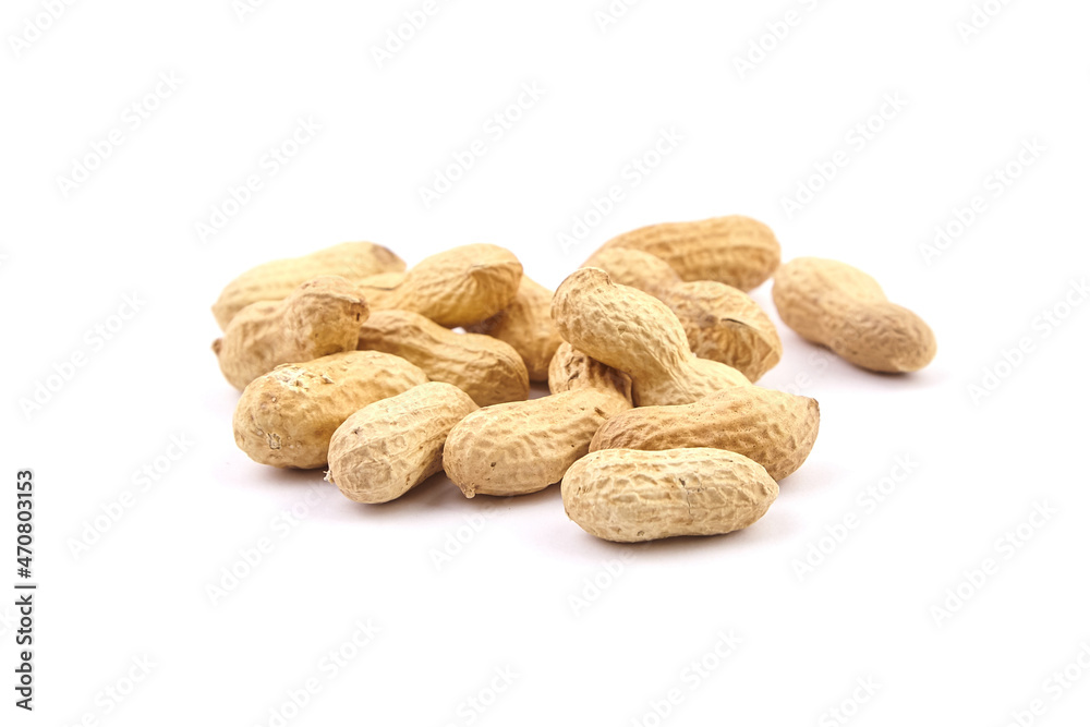 Roasted peanuts in shell isolated on white Roasted peanuts in shell isolated on white