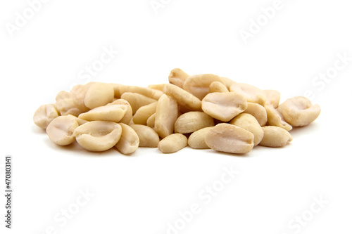 Raw blanched peanuts isolated on white photo