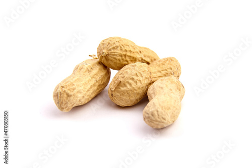 Roasted peanuts in shell isolated on white