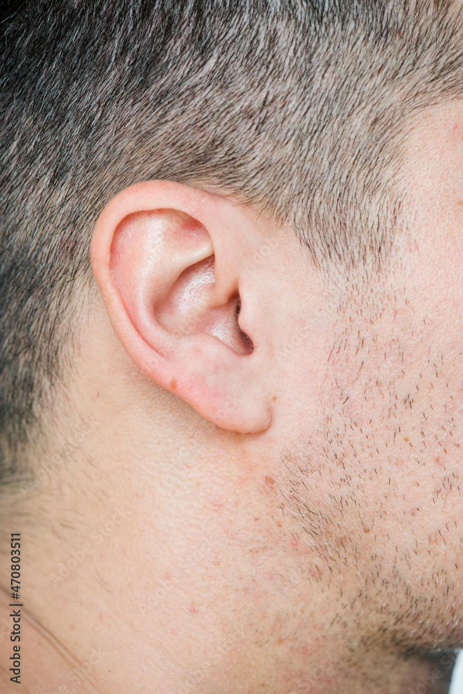Naklejka premium Closeup of white man's ear