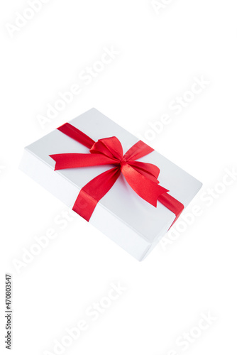 White gift box cap with red ribbon