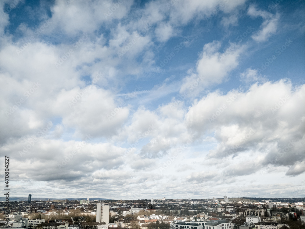 Cityscape with cloudy blue sky