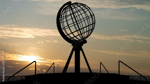 Globe at the North Cape, Time Lapse at Sunrise with Colorful Clouds, Norway photo