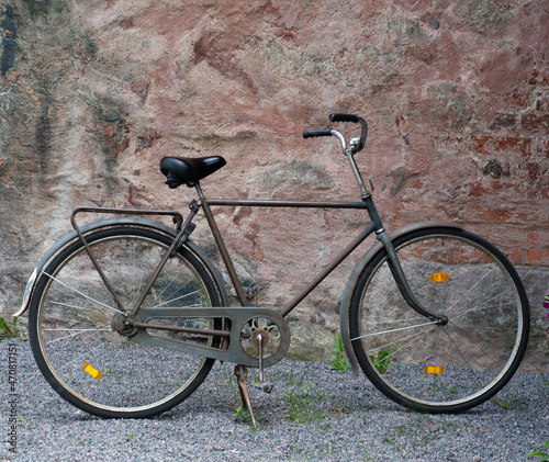 old bicycle on a wall