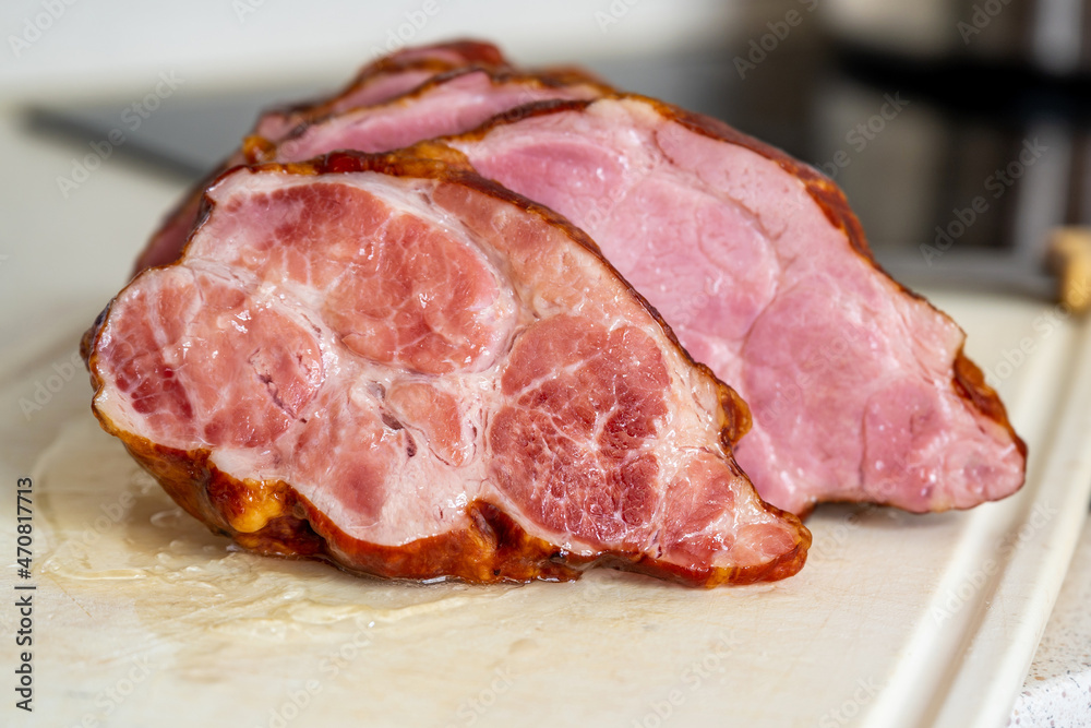 Sliced smoked meat on white. Nice texture.