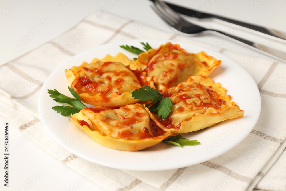 Delicious food concept with ravioli on white background