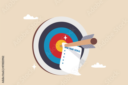 Set new year goals, target or resolution at the beginning of the year, determination or inspiration to improve and success concept, archer arrow with paper writing new year goals on bullseye target. photo