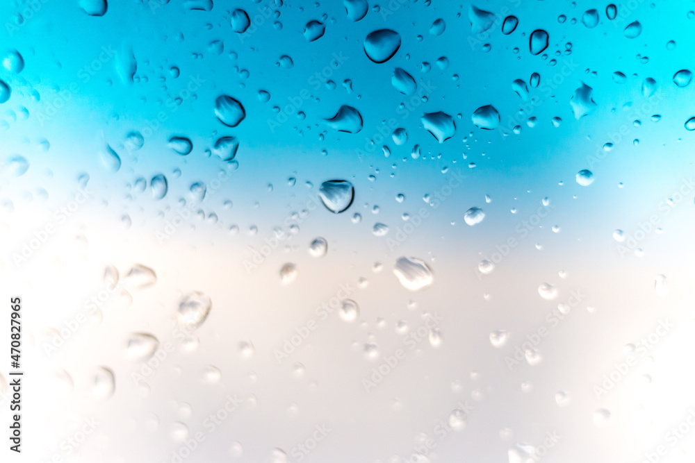 Rain drops on window glass outside texture background water