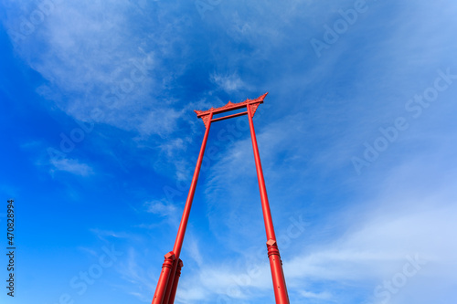Photography The giant swing on the background of the sky and clouds