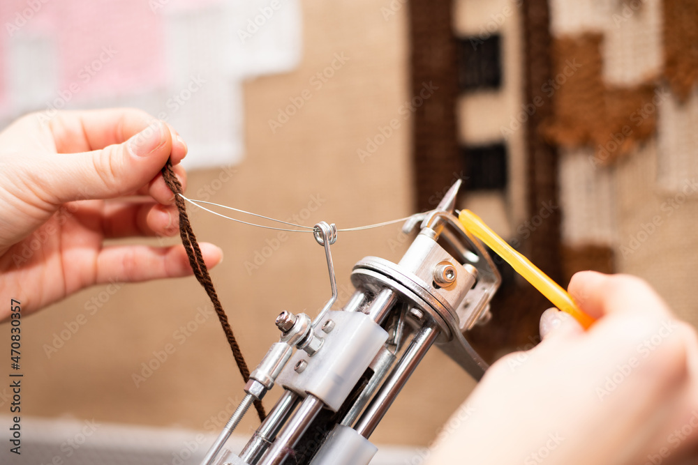 Tufting process making a tufted rug using a tufting gun and acrylic