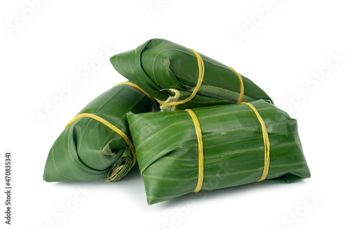 Banana leaf wrapped Thai dessert or food for steamed isolated on white background.
