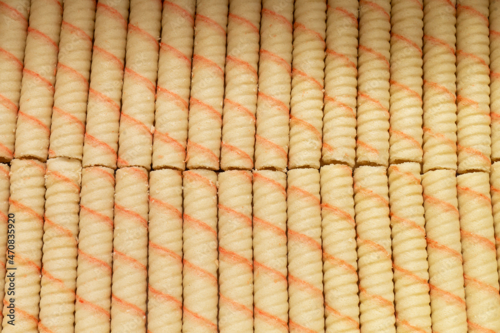 Fototapeta premium Sweet sticks with stuffing wrapped in a roll .