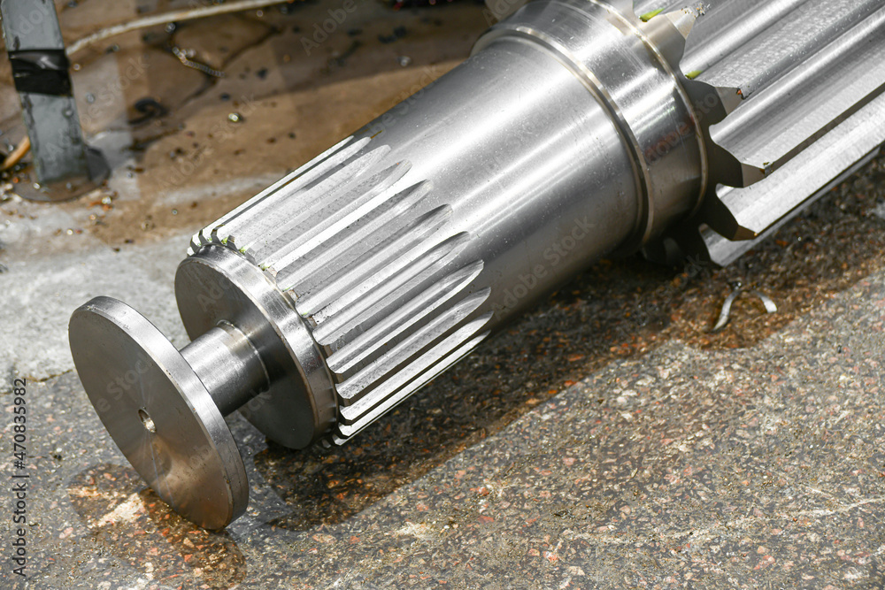 Splined shaft gear after cutting a tooth on a gear cutting machine. Splined shaft gear after cutting a tooth on a gear cutting machine.