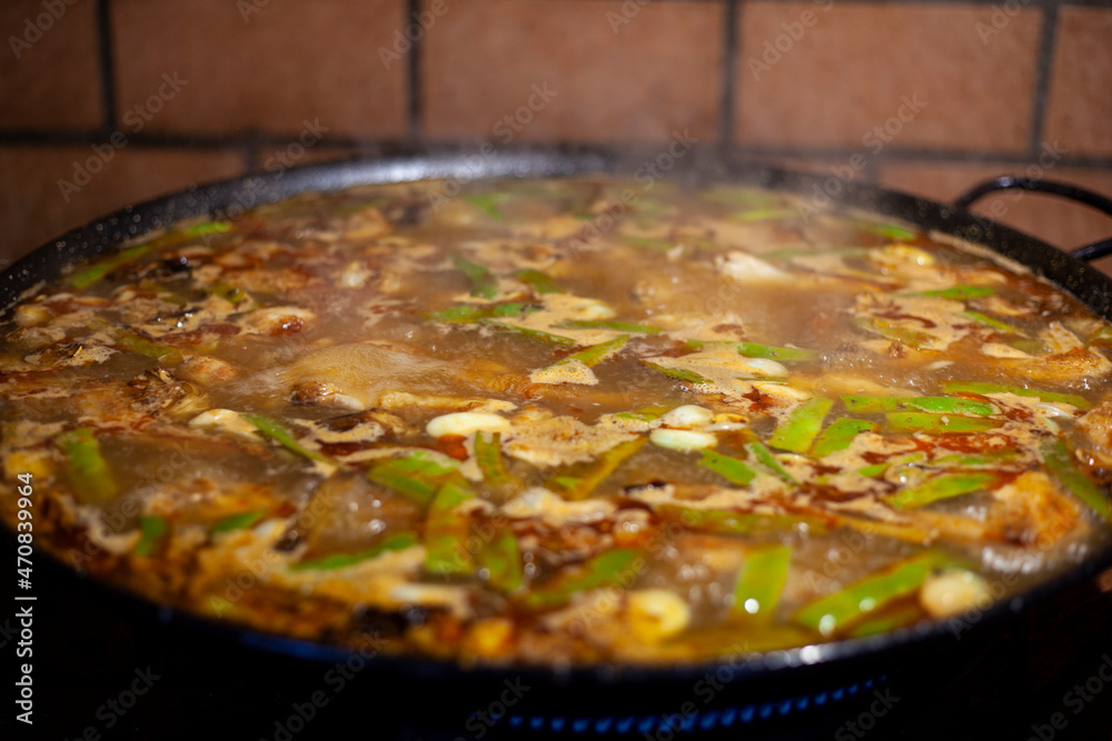 preparation of typical Valencian paella
preparation of typical Valencian paella