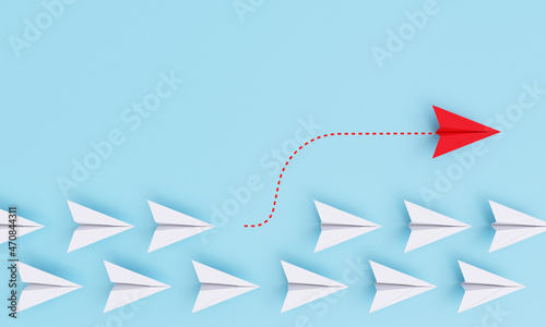 Red paper plane out of line with white paper to change disrupt and finding new normal way on blue background. Lift and business creativity new idea to discovery innovation technology by 3d rendering.