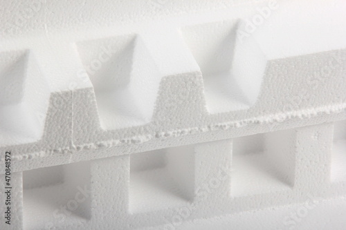 Styrofoam Sheets of different shapes on white background. Pieces of white styrofoam close up. Crumbled styrofoam pieces isolated on white background 