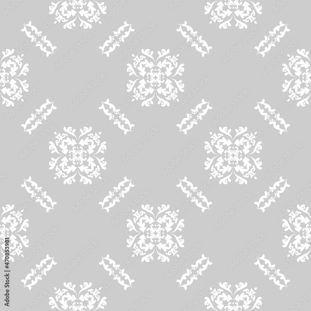 Seamless damask white pattern on gray background. Modern arabic pattern. Vector pattern with ornament. Background, wallpaper, wrapping, textile template.