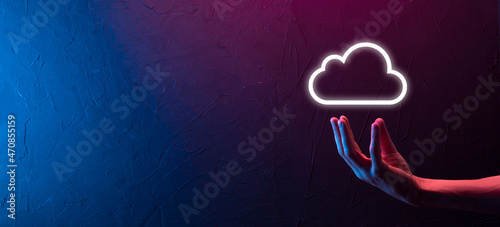 Hand holding icon cloud computing network and icon connection data information in hand. Cloud computing and technology concept.