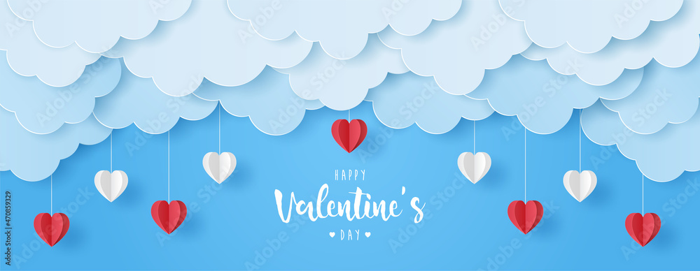 Paper cut of Happy Valentine's Day text with red and white heart, cloud on blue sky background for greeting card, banner and headers website