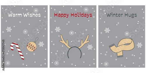 Collection of postcards with a Christmas ball, candy cone, reindeer headband, winter scarf and cozy slogan in flat design. Vector illustration