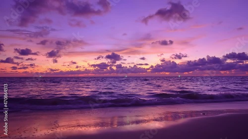 Tropical sea at sunset or sunrise over sea video 4K, The sun touches horizon, Red sky in golden hour amazing seascape,Ocean beach sunsets,The sun in spindrift clouds Fantastic natural sunsets