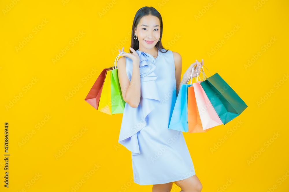 Portrait beautiful young asian woman smile with shopping bag Portrait beautiful young asian woman smile with shopping bag