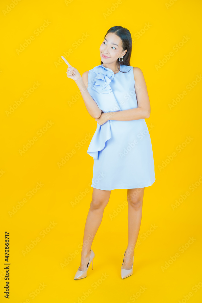 Portrait beautiful young asian woman smile with action Portrait beautiful young asian woman smile with action