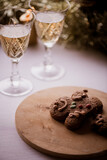 Christmas themed background-a gingerbread man cookie on a christmas decorated table