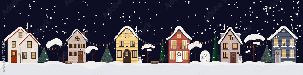 Fototapeta premium Vector illustration of winter snowy night street. Urban landscape with cute houses, trees in snow and christmas garlads, snowman. Flat buildings isolated on white background.
