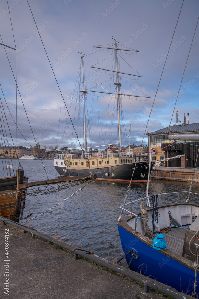 Old sailing, fishing and cargo boats in the bay Ladugårdsviken a color full autumn day in Stockholm Old sailing, fishing and cargo boats in the bay Ladugårdsviken a color full autumn day in Stockholm