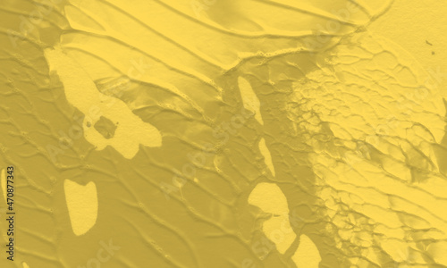 An abstract acrylic painting background with goldenrod color