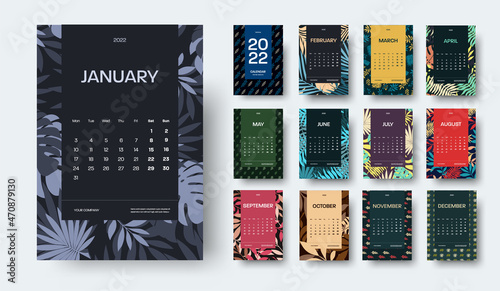 Vector vertical calendar 2022 template, tropical pattern, color, black insert with months, exotic leaves on background.